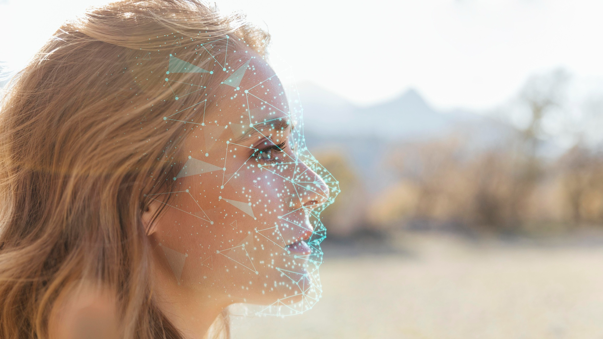 Woman side profile with facial-scan network overlay